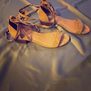 In style lace up sandals.